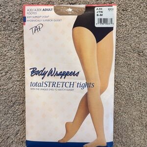 Body Wrappers nude footed tights. Adult s/m